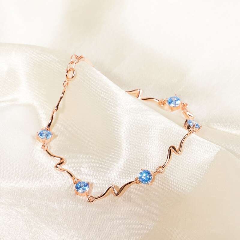 MILLENNE Multifaceted Blue Topaz ZigZag Rose Gold Bracelet with 925 Sterling Silver