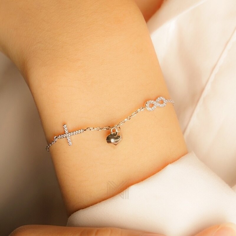 MILLENNE Millennia 2000 Cross and Heart Infinity Cubic Zirconia Silver Adjustable Bracelet with 925 Sterling Silver