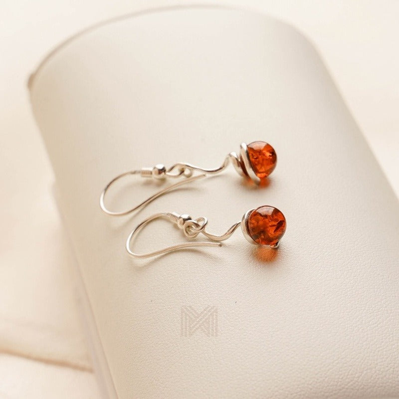 MILLENNE Multifaceted Baltic Amber Pill Silver Earrings with 925 Sterling Silver